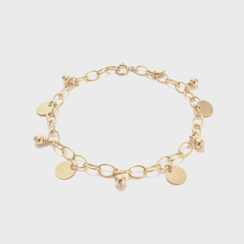 gold beads and discs bracelet